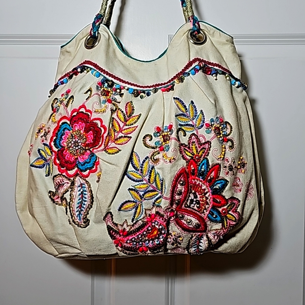 Accessorize bag with beaded beautiful design